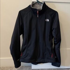 The North Face Black Softshell Jacket with Red Zipper Accents